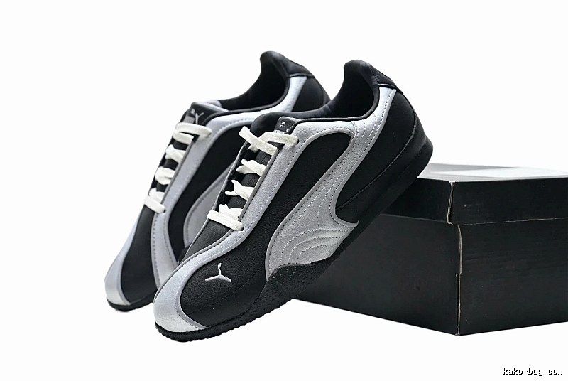 PUMA retro style black and silver sports shoes