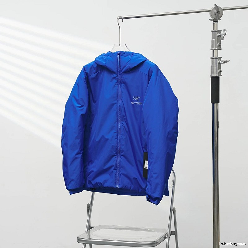 Arc'teryx Royal Blue Lightweight Shell Jacket with vivid hooded finish and compact outdoor profile
